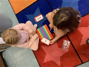 Students using the Pop-its to practice keyboarding skills.